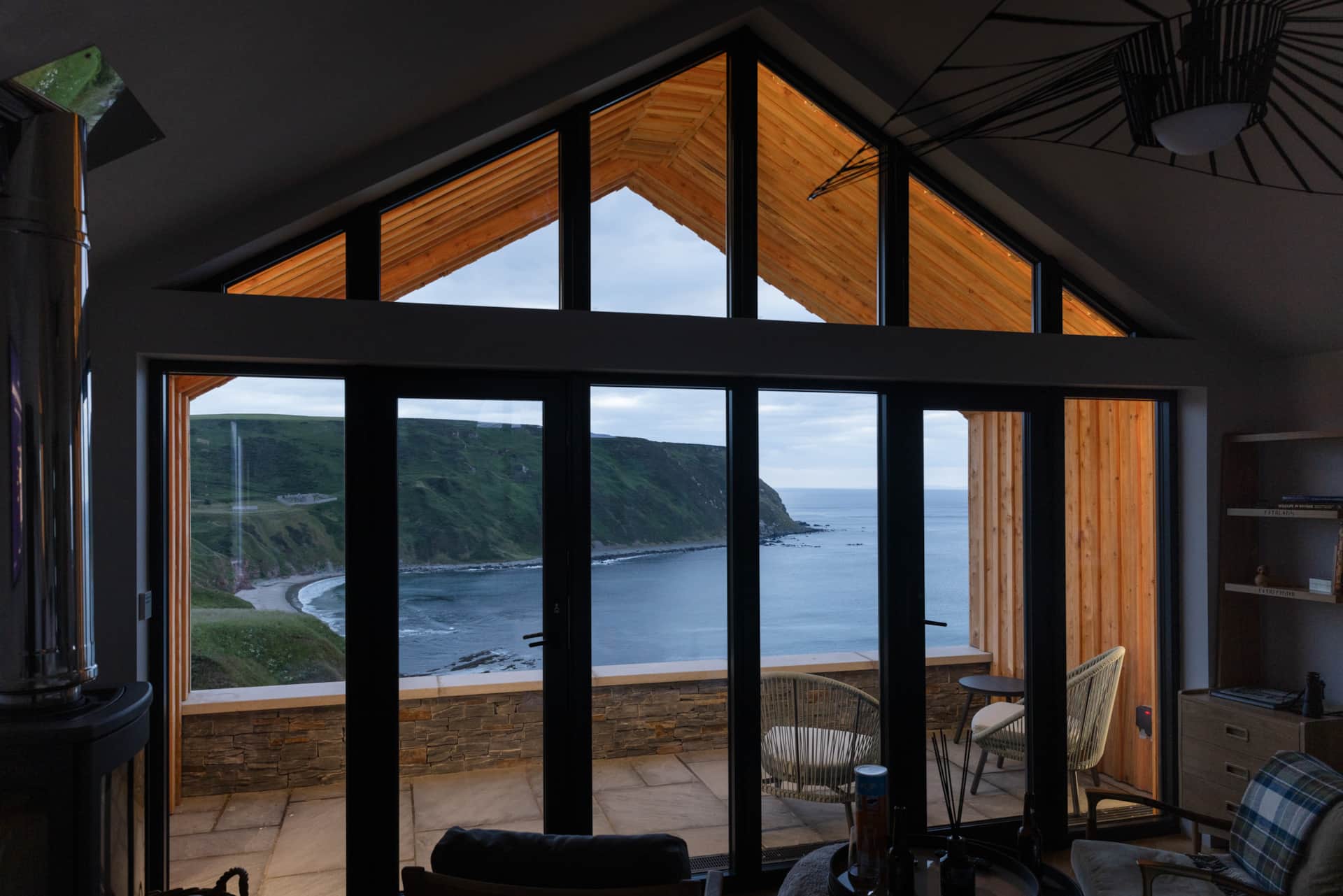 Twilight sea view through the gable window