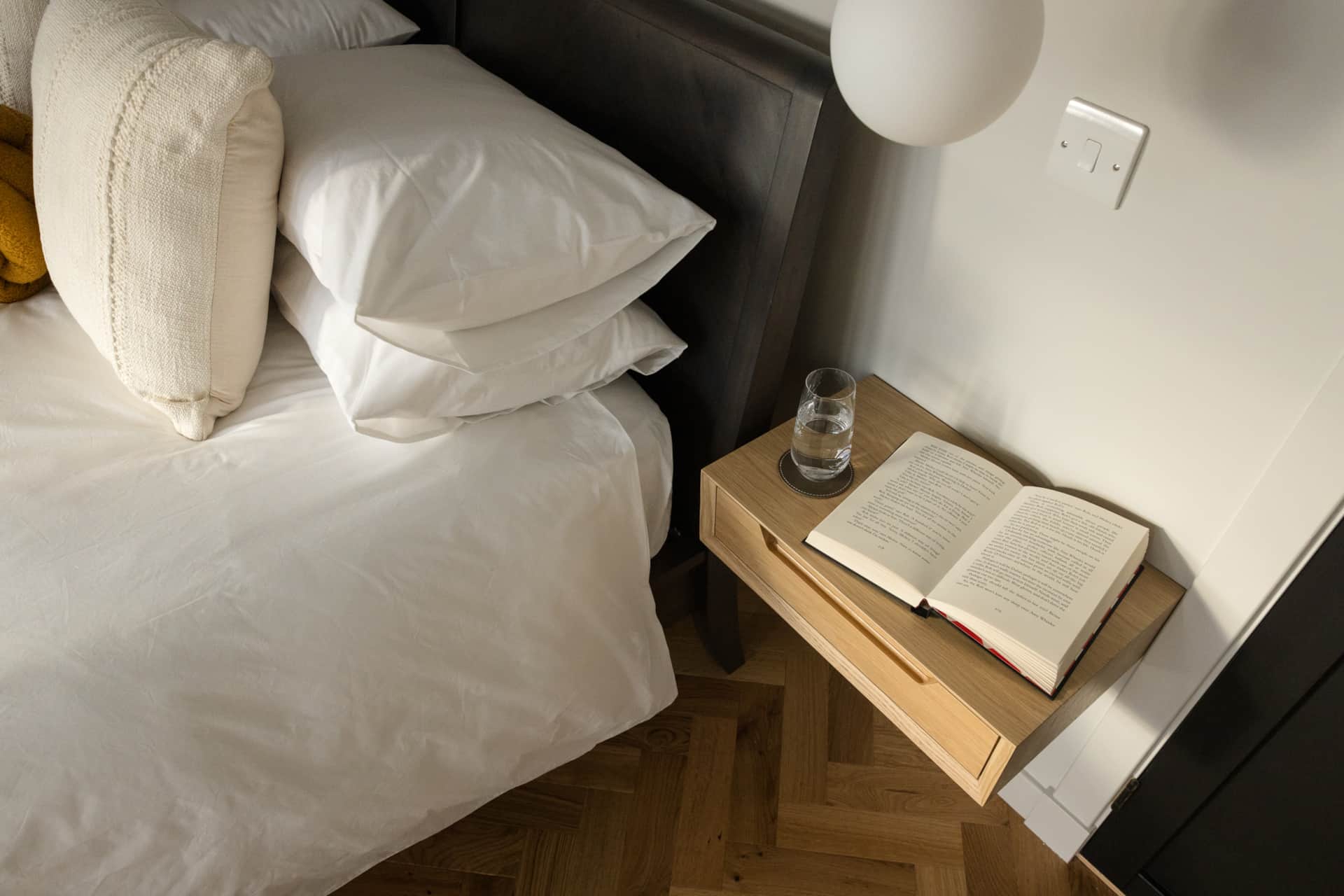 Bedside table with a book