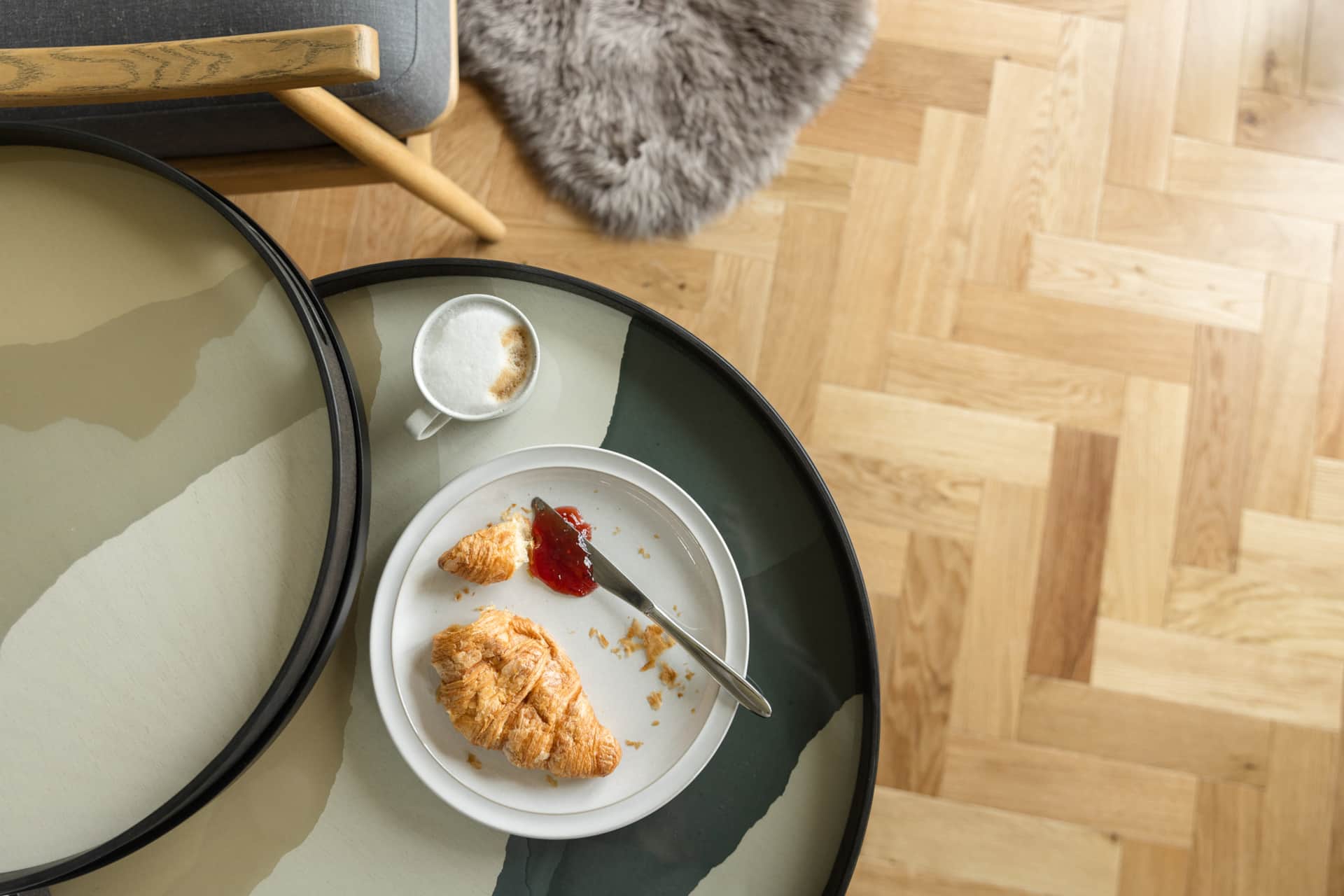 Croissant and coffee on the tray table