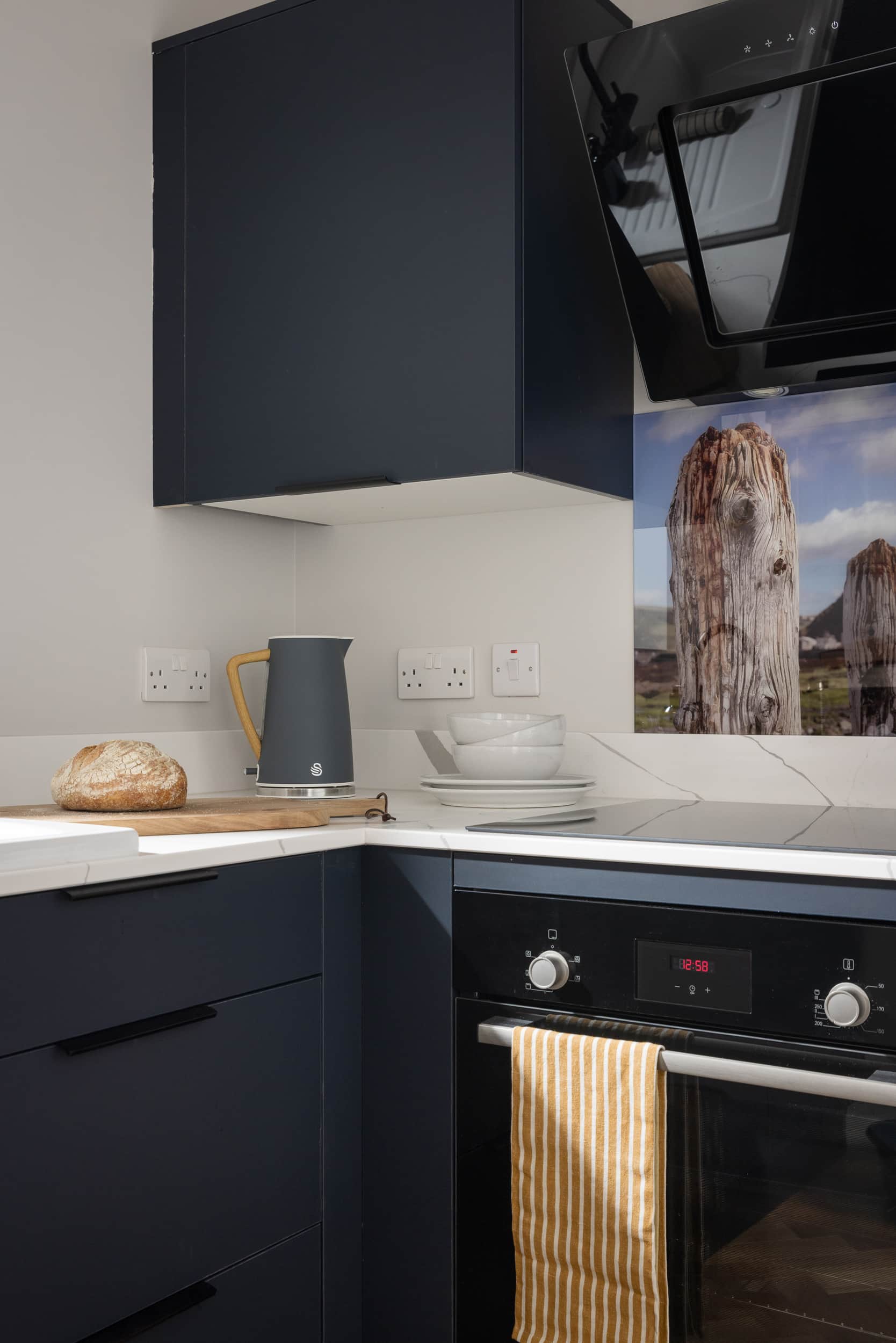 Kitchen counter detail with fresh bread and kettle