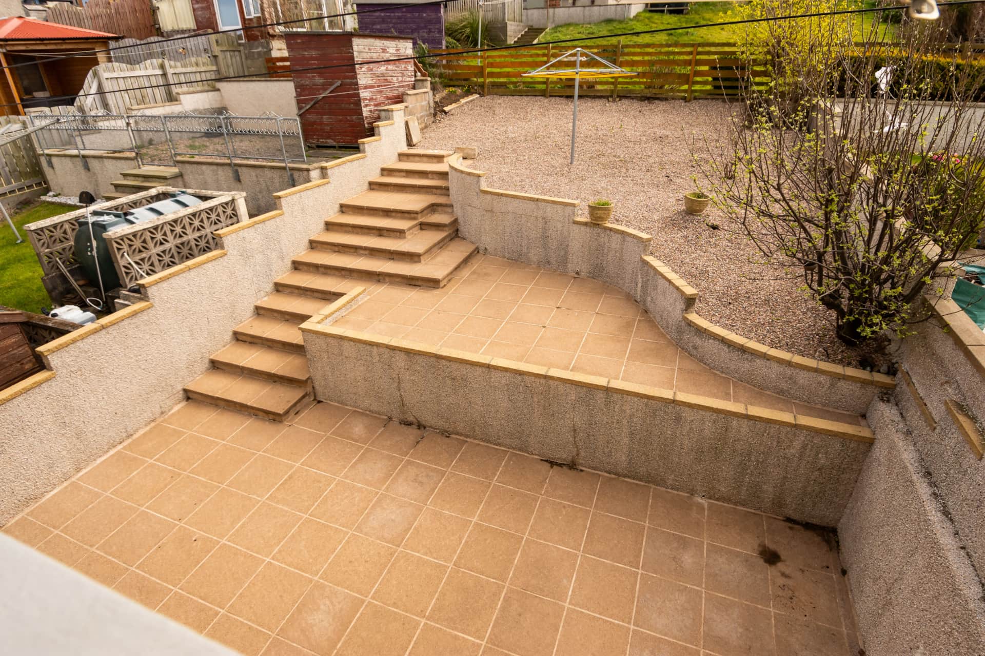 Tiered garden patio with steps