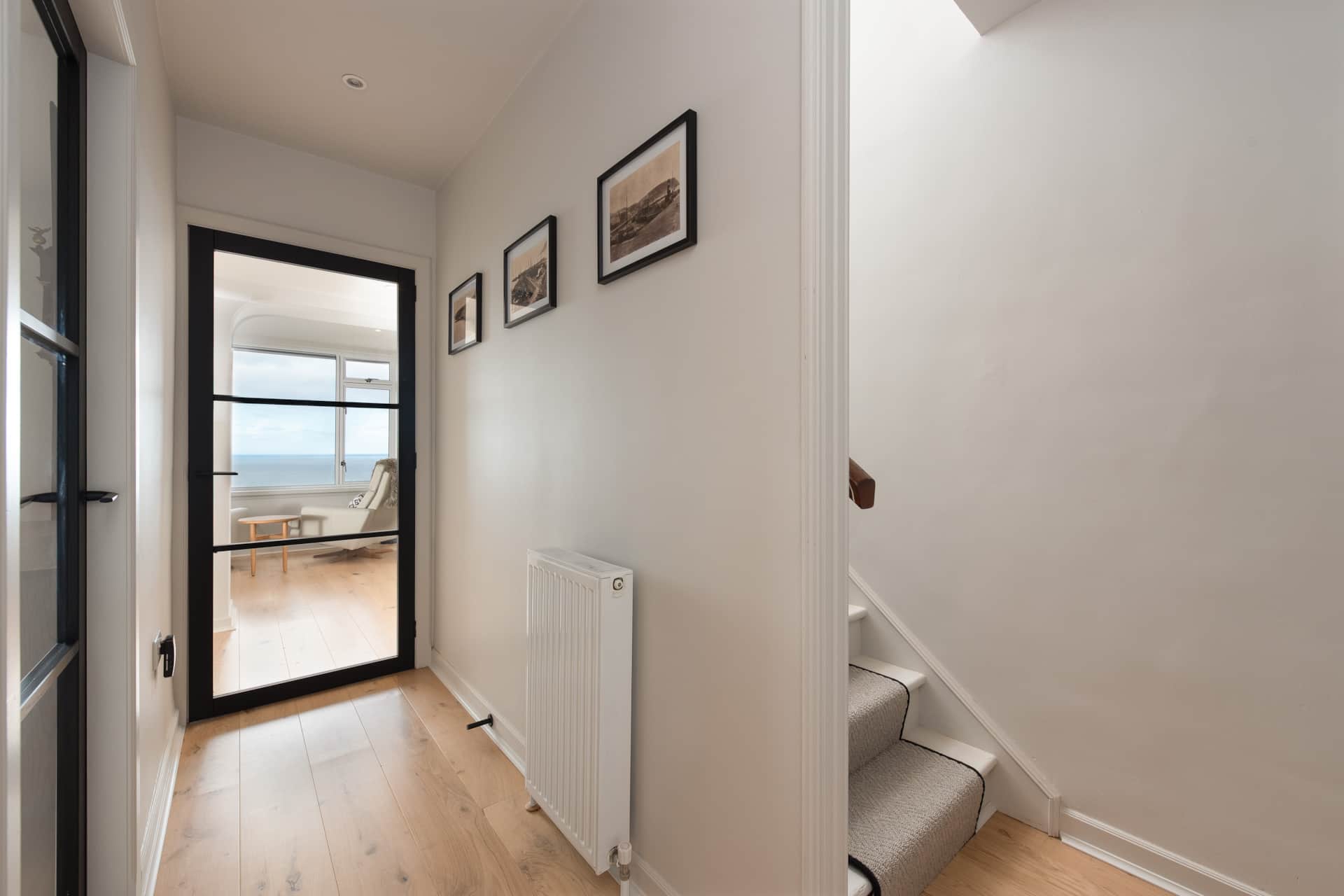Hallway with a sea view beyond