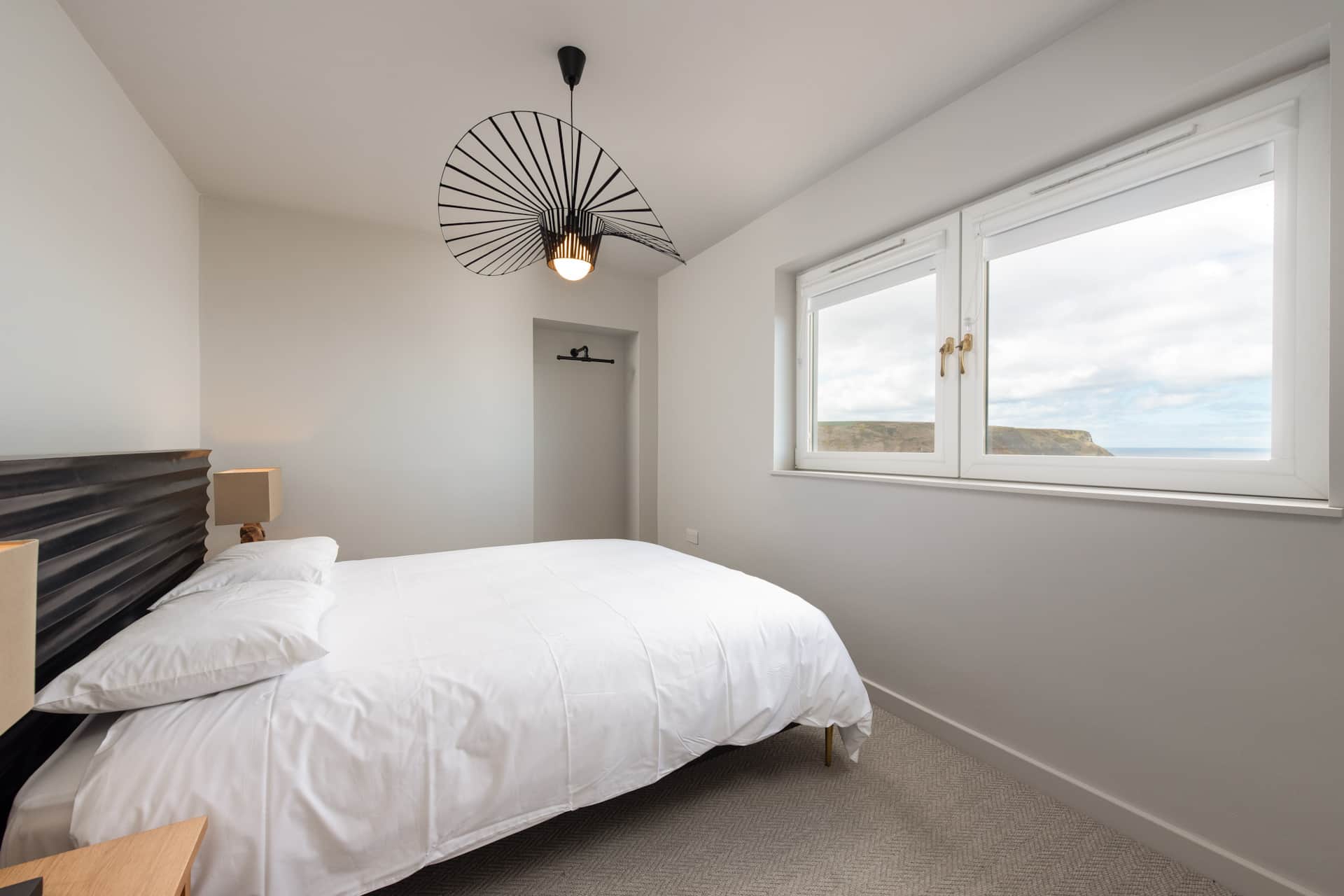 Bedroom with a clifftop view